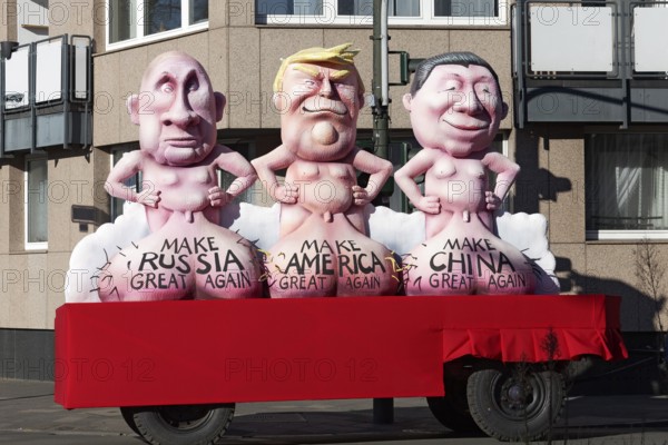 Autocrats Trump, Putin and Xi with big scrotums, Make America, Russia, China Great Again, papier-mâché figures, theme float by Jacques Tilly, Rosenmontagszug 2025, Düsseldorf, Rhineland, North Rhine-Westphalia, Germany, Europe