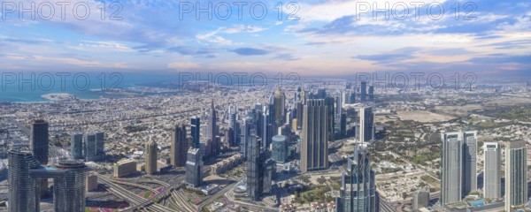 UAE, Dubai panoramic skyline view of city financial downtown and Dubai Mall.