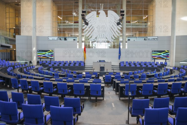 The plenary chamber of the Bundestag with many blue seats and the German flag, Reichstag building, German Bundestag, Berlin, Germany, Europe