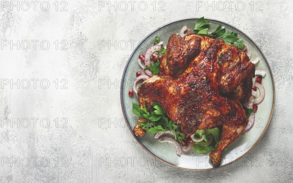 Whole fried chicken, with spices, grilled chicken, on a light background, top view, homemade, no people