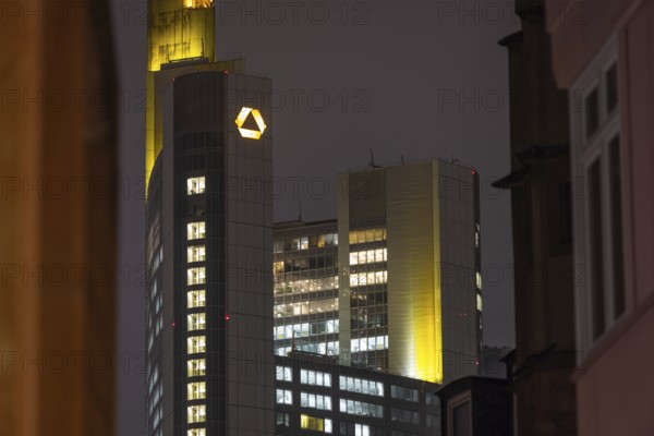 The lights in the offices of the Commerzbank Tower in Frankfurt am Main shine in the evening, New Old Town, Frankfurt am Main, Hesse, Germany, Europe