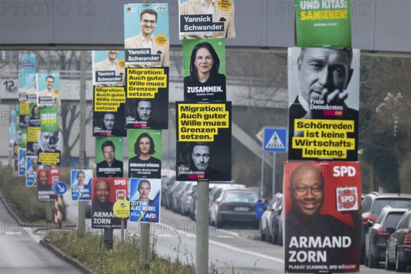 Election posters of the established parties CDU, AfD, Bündnis 90, Die Grünen, SPD and FDP hang on several lampposts in the north-west of Frankfurt. The early federal election will take place in Germany on 23 February 2025, Nordweststadt, Frankfurt am Main, Hesse, Germany, Europe