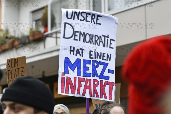 Heidelberg, Germany - February 12th 2025: Protest sign against CDU politican Friedrich Merz at protest against far-right