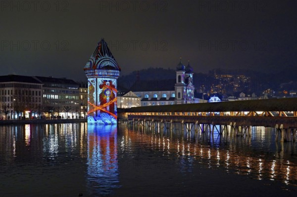Wassertum with light installation, Chapel Bridge on the right, Jesuit Church on the Reuss at dusk behind, Old Town, Lilu, Light Festival 2025, Lucerne, Canton of Lucerne, Switzerland, Europe