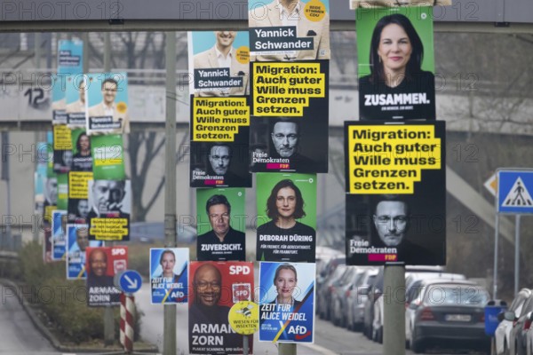 Election posters of the established parties CDU, AfD, Bündnis 90, Die Grünen, SPD and FDP hang on several lampposts in the north-west of Frankfurt. The early federal election will take place in Germany on 23 February 2025, Nordweststadt, Frankfurt am Main, Hesse, Germany, Europe