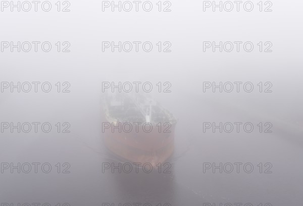 Tanker JAZZ sailing in fog in the Kiel Canal, Kiel Canal, NOK, Schleswig-Holstein, Germany, Europe