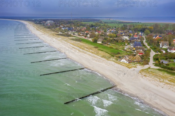 Aerial view over seaside resort Ahrenshoop and sand beach on the Fischland-Darß-Zingst peninsula along the Baltic Sea, Mecklenburg-Vorpommern, Germany, Europe