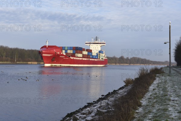 Container ship Frederik sailing in the Kiel Canal, NOK, Kiel Canal, Schleswig-Holstein, Germany, Europe