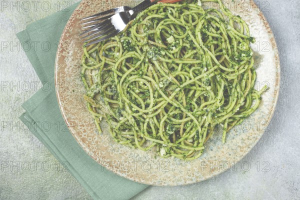 Spaghetti with pesto sauce, homemade, no people