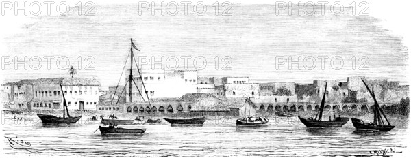 City view of Zanzibar from the seaside, Unguja Island or Zanzibar in the Indian Ocean, sailing boats, Tanzania, colonial period, historical illustration 1886, Africa