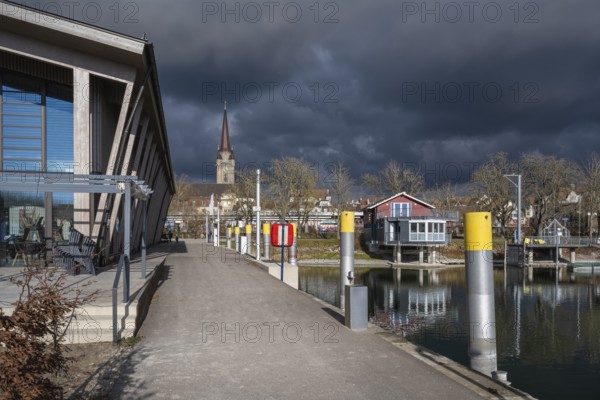 The harbour pier and the marina of Radolfzell on Lake Constance, behind it the cathedral tower, district of Constance, Baden-Württemberg, Germany, Europe