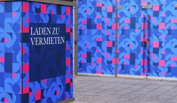 Shop for rent, red blue graphic on a commercial property, Berlin, Germany, Europe