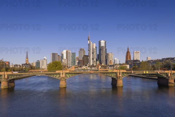 The sun shines on the skyscrapers of Frankfurt's banking skyline in the morning, Frankfurt am Main, Hesse, Germany, Europe