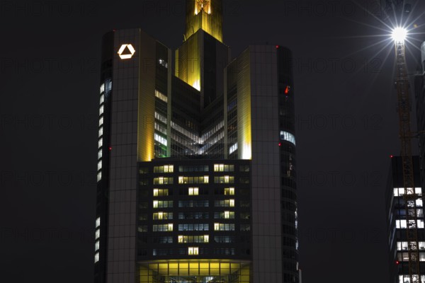 At a height of around 150 metres, 48 spotlights in 22 windows in the Commerzbank Tower in Frankfurt am Main illuminate a yellow heart that will shine towards the city centre every day from 7 p.m. to midnight until the end of the year. In this way, Commerzbank wants to radiate cohesion and community clearly visible to the outside world. Frankfurt am Main, Roßmarkt, Hesse, Germany, Europe