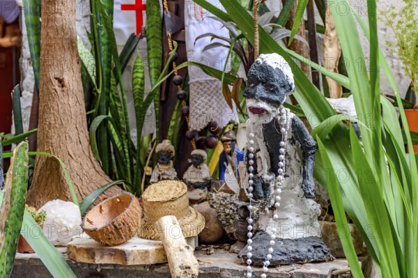 Afro-Brazilian religious altar with Umbanda objects and entities among plants, Belo Horizonte, Minas Gerais, Brazil, South America