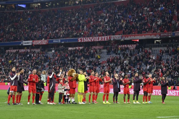 FC Bayern Munich FCB players celebrate victory with fans in the fan curve, Allianz Arena, Munich, Bavaria, Germany, Europe