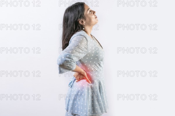 Suffering girl with back pain isolated. Young woman with spine problems isolated. Person with back pain. lumbar problems concept
