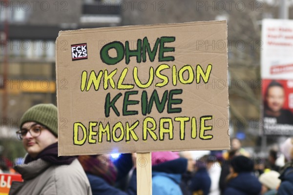 Heidelberg, Germany - February 12th 2025: Sign with text saying 'without inclusion there is no democracy' at protest against far-right