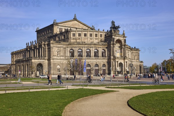 Semperoper, Opera House of the Dresden State Opera, architectural style Neo-Renaissance, garden with lawn, pedestrians as accessories, theatre square, Dresden, state capital, independent city, Saxony, Germany, Europe