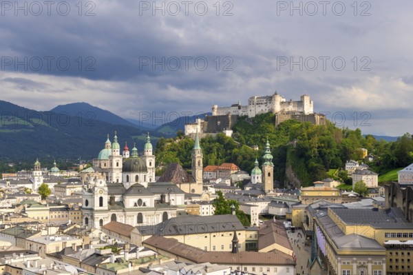Panorama of the historic centre of Salzburg with Hohensalzburg Fortress and dramatic cloud cover, Salzburg, Salzburger Land, Austria, Europe