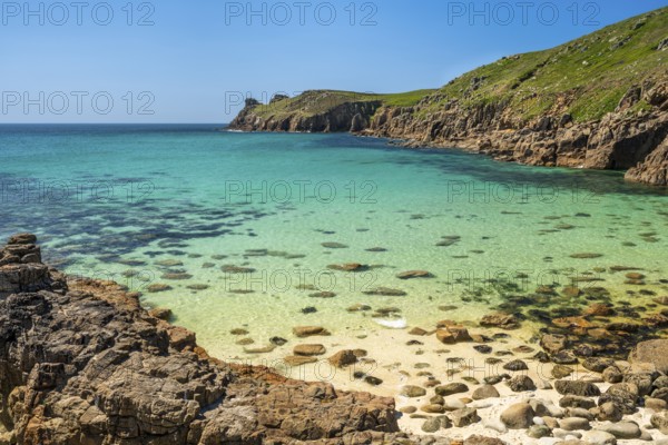 Coastal landscape. sandy beach beach and rocks in Nanjizal Bay or Nanjizal Beach. St Just, Penzance, Cornwall, England, Great Britain