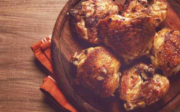 Fried chicken thighs, with spices, homemade, no people