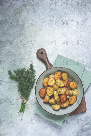 Baked new potatoes, with butter and dill, homemade, no people