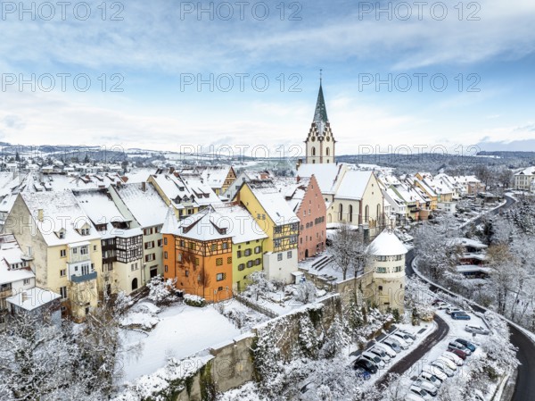 Aerial view of the snow-covered town of Engen in Hegau on a winter morning with the Church of the Assumption of the Virgin Mary in the old town centre, Constance district, Baden-Württemberg, Germany, Europe