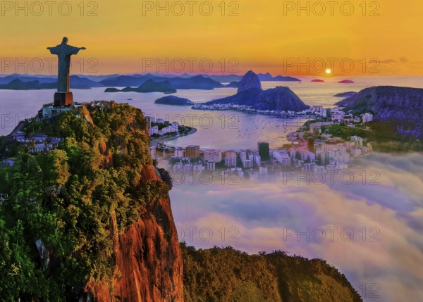 Corcovado 710m with Christo Redentor statue above Botafogo Bay with Sugar Loaf 396m at sunrise and morning fog, Rio de Janeiro, Brazil, South America