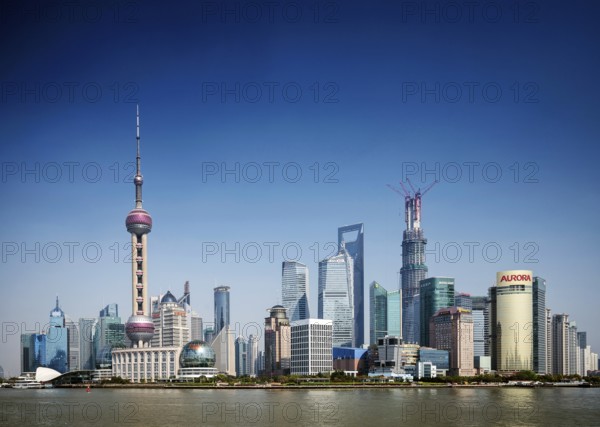 Pudong riverside modern urban skyline skyscrapers in central shanghai city china by day