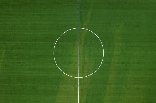 Aerial photographic documentation of an empty green football pitch