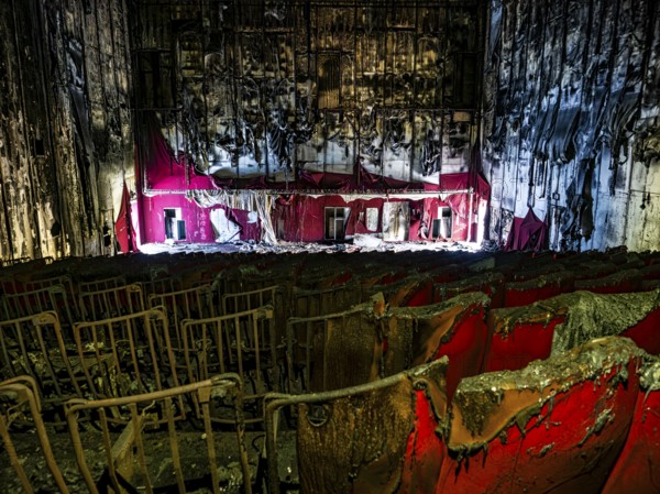 Abandoned and burned cinema hall in an old multiplex cinema