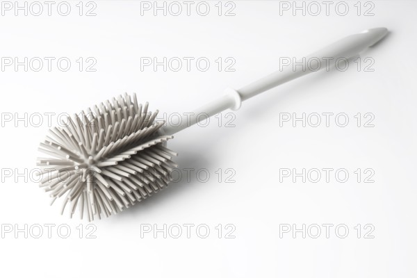 modern toilet brush with silicone bristles on white background