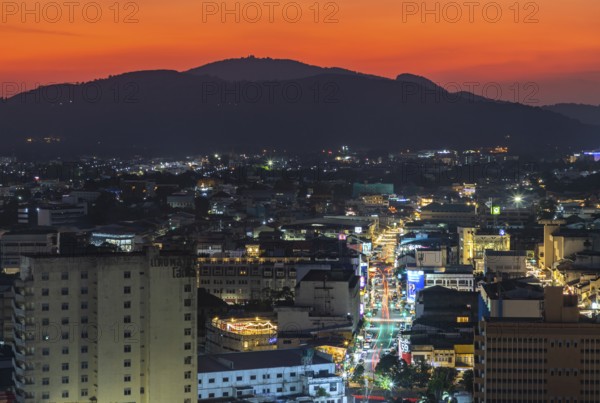 A picture of the town of Phuket at sunset or early evening