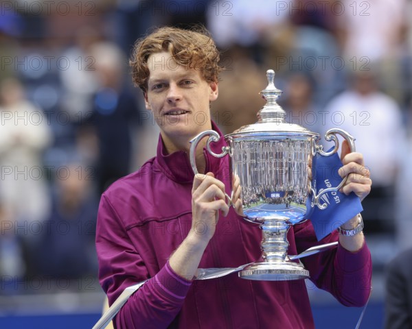 Tennis player Jannik Sinner of Italy holding the trophy during the presentation at the US Open 2024 Championships, Billie Jean King Tennis Center, Queens, New York, USA, North America