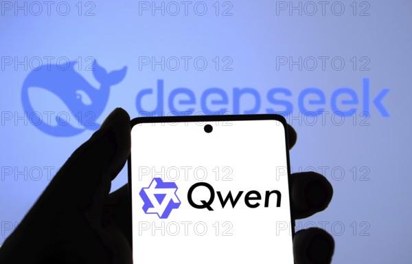 Alibaba Qwen 2.5 logo is displayed on smartphone