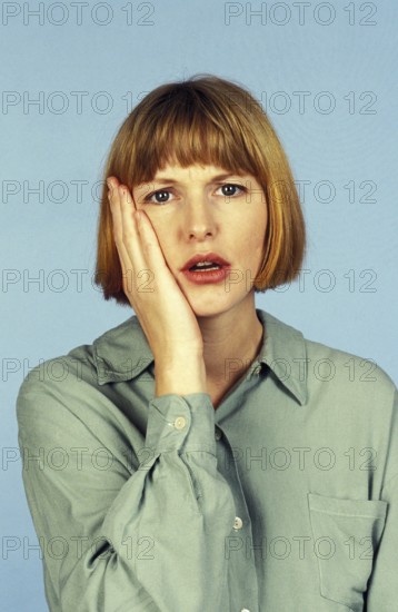 Woman with Toothache