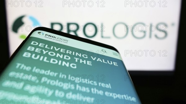 Stuttgart, Germany, 06-18-2022: Mobile phone with website of US real estate company Prologis Inc. on screen in front of business logo. Focus on top-left of phone display, Europe