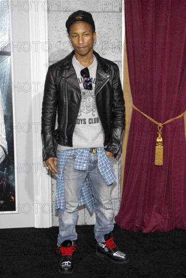 Pharrell Williams at the Los Angeles premiere of 'Sherlock Holmes: A Game Of Shadows' held at the Regency Village Theatre in Westwood on November 6, 2011. Westwood, California, USA, North America
