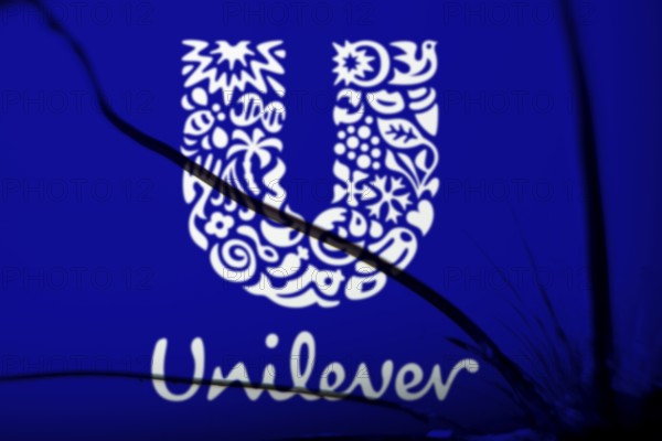 unilever logo is visible on the broken glass. Unilever PLC is a British multinational fast-moving consumer goods company