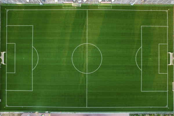 Aerial photographic documentation of an empty green football pitch