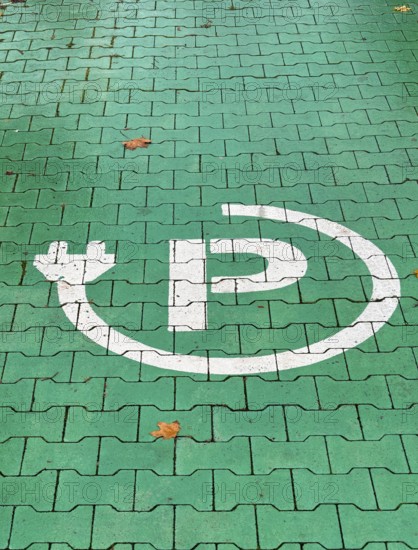 Parking space for electric cars