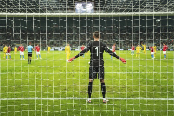 Net in the football goal penalty shootout in the background.