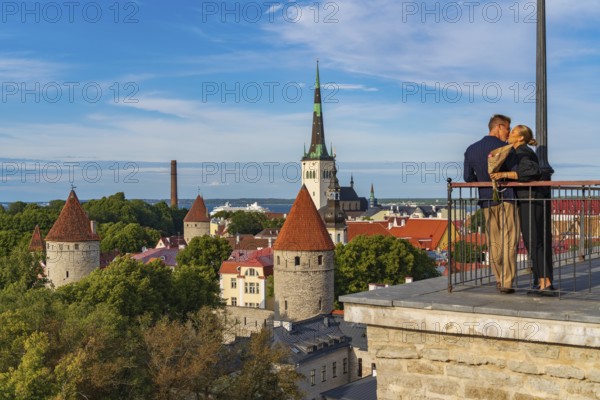 A couple in the old town of Tallinn, Estonia, Europe