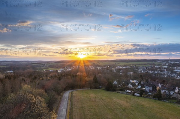 Sunset, Aerial view over forests and meadows of Westerwald, Altenkirchen, Germany, Europe