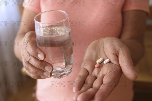Woman accepts medicine