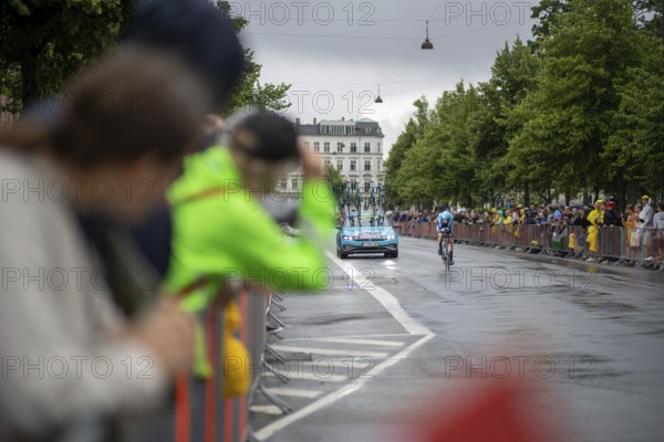 Copenhagen, Denmark, July 01, 2022: A participant and spectators at the Tour de France in the city centre, Europe