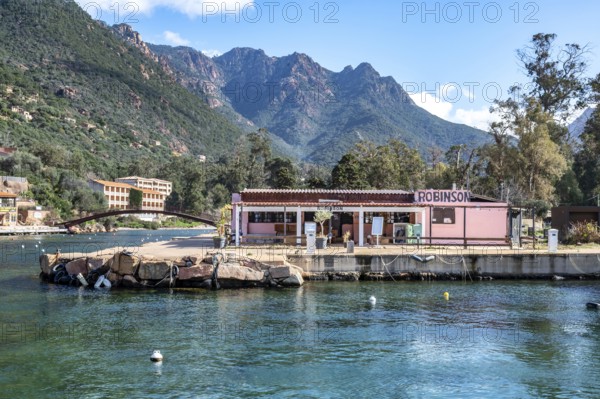 The harbour restaurant Robinson in Porto-Marina at the mouth of the river Porto in the World Heritage Gulf of Porto, Porto, Ota, west coast of Corsica, Corsica, France, Europe
