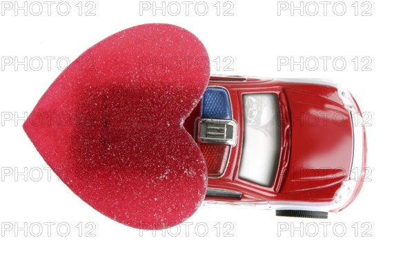 Red police car in Valentines day, good heart metaphor