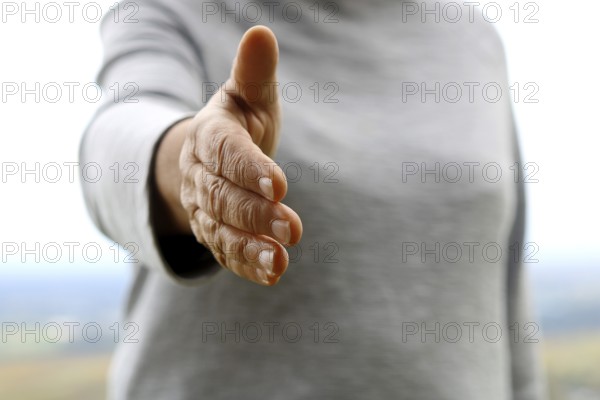 Greeting with a handshake